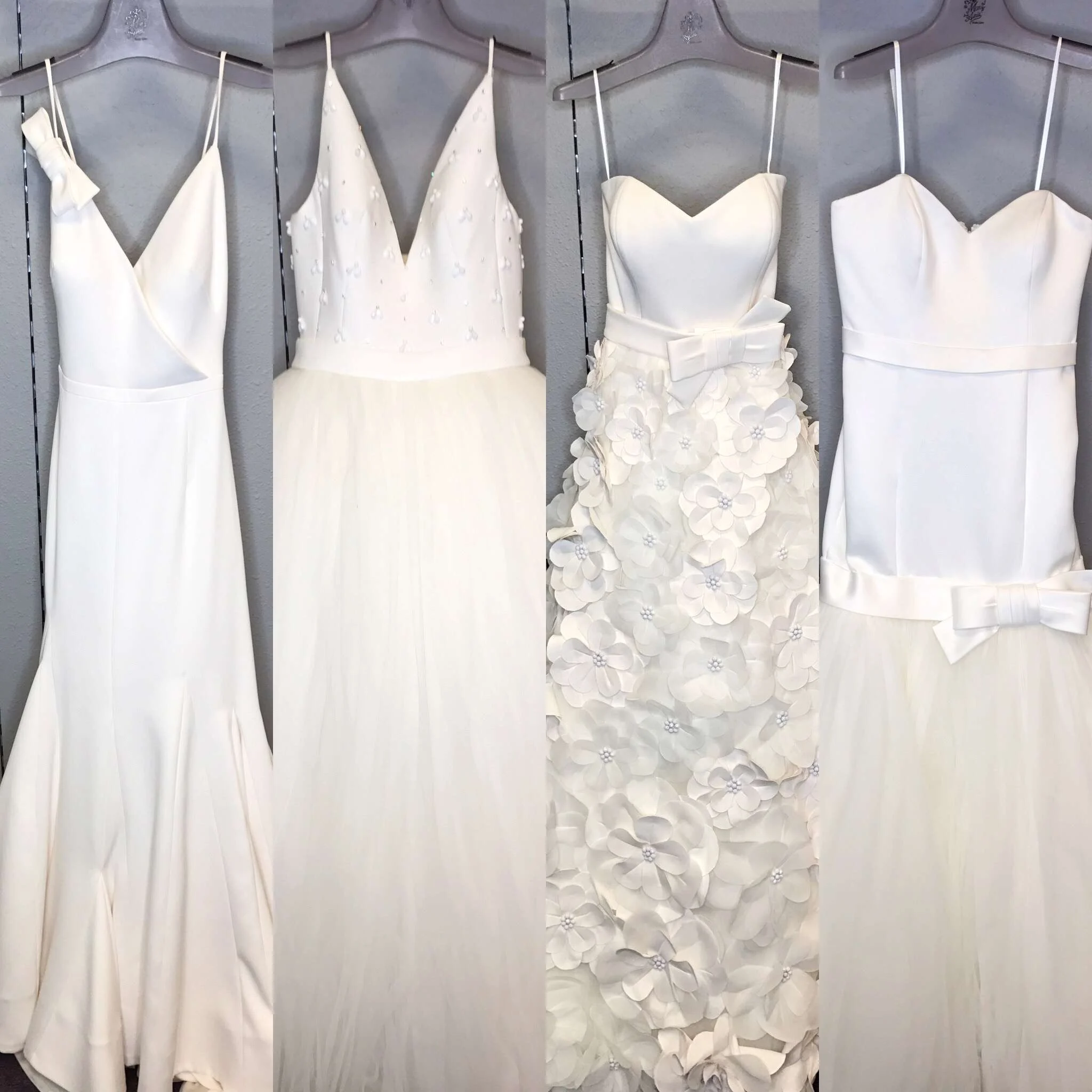 Row of ivory wedding gowns hanging on a rack at Mon Amie Bridal Salon