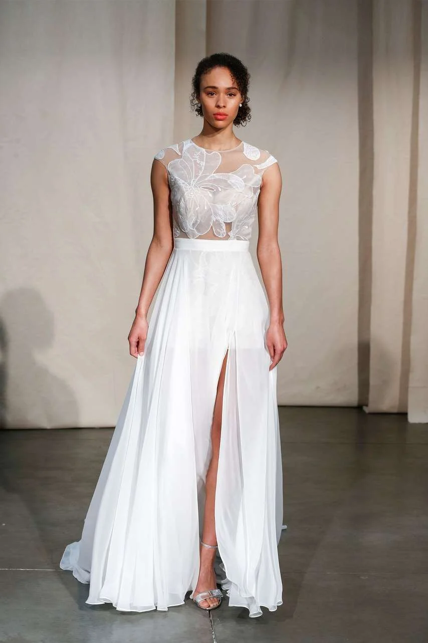 Justin Alexander Spring 2020 lace cap-sleeve gown with a high front slit