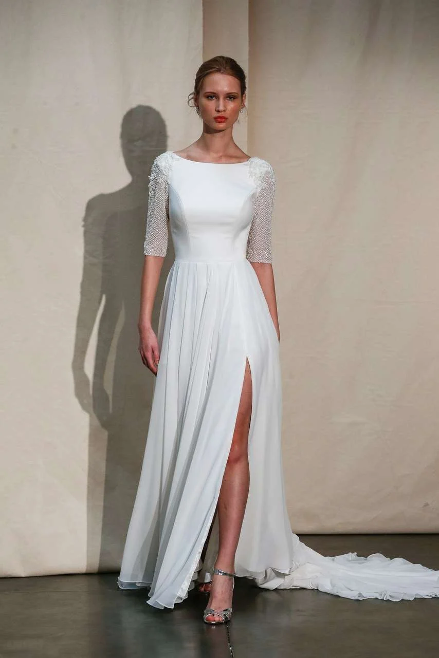 Justin Alexander Spring 2020 bateau-neck long-sleeve crepe gown with a slit